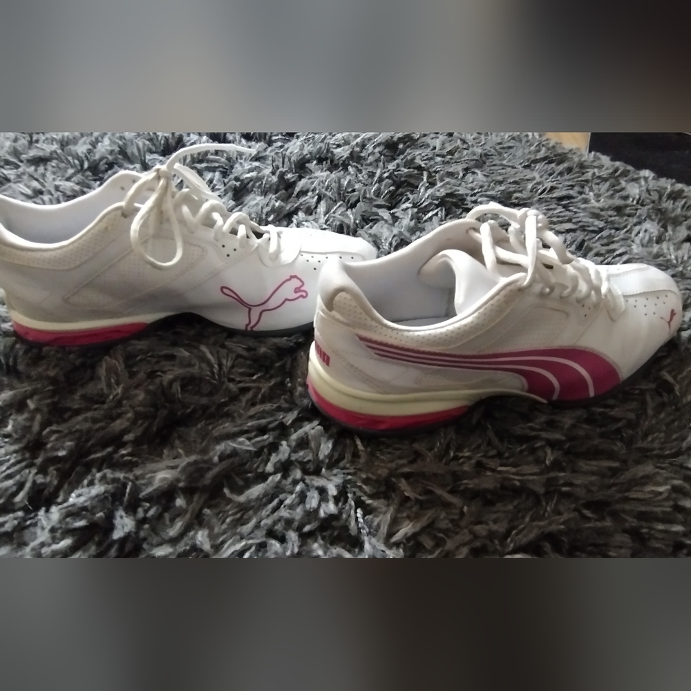 Barley worn pink and white ladies Pumas
